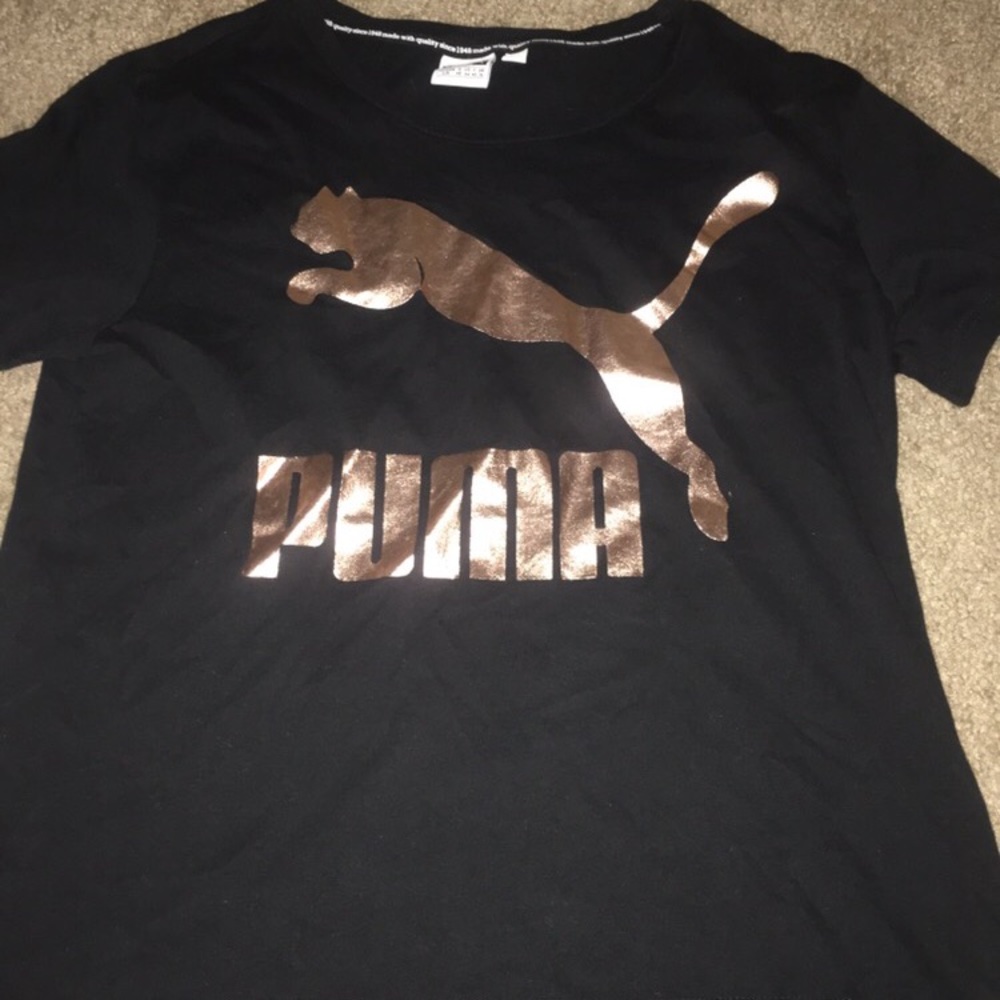 Black and gold puma women size large